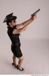 NIKITA STANDING POSE WITH GUN